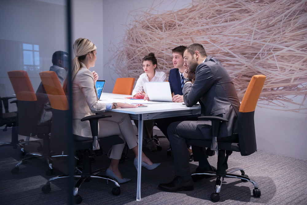 young business people group have meeting and working in modern bright office indoor